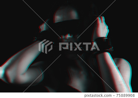 portrait of a passionate submissive girl in leather handcuffs and a blindfold 75889908