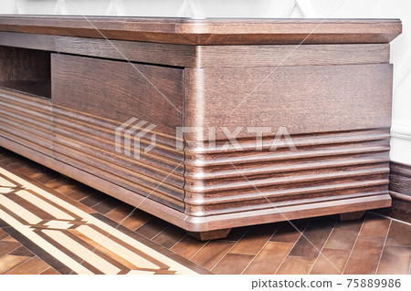 Commode for TV set of oak lumber on wood block parquet floor 75889986