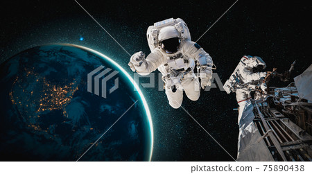 Astronaut spaceman do spacewalk while working for space station 75890438