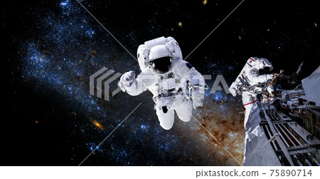 Astronaut spaceman do spacewalk while working for space station 75890714