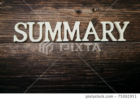 Summary alphabet letters on wooden background 75892951