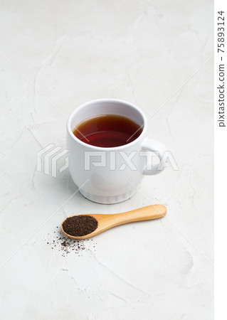Black tea and tea leaves Black tea and tea leaves 75893124