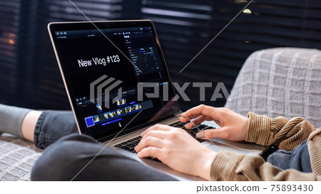 Young content creator girl is on her laptop Young content creator girl is on her laptop 75893430