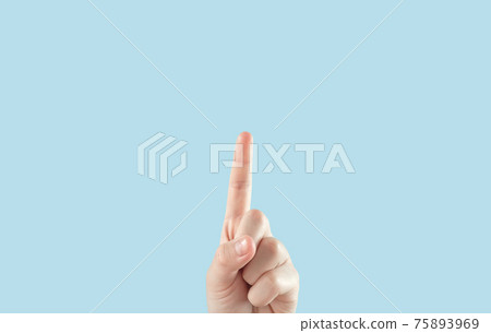 Expression of the hand. A child's hand pointing upwards. Raise your index finger up. 75893969