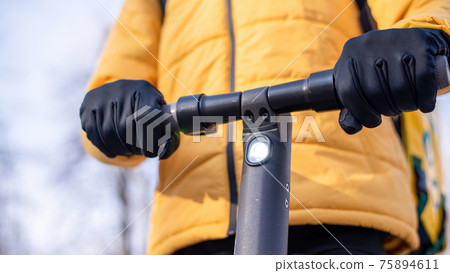 Food delivery man on a scooter Food delivery man on a scooter 75894611