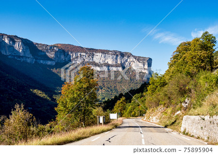 French countryside. Saint Julien en Vercor: view of the heights of the Vercors and the valley Val de Drome in France French countryside. Saint Julien en Vercor: view of the heights of the Vercors and the valley Val de Drome in France 75895904