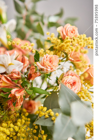 Finished flower arrangement in a vase for home. Flowers bunch, set for interior. Fresh cut flowers for decoration home. European floral shop. Delivery fresh cut flower. 75895998