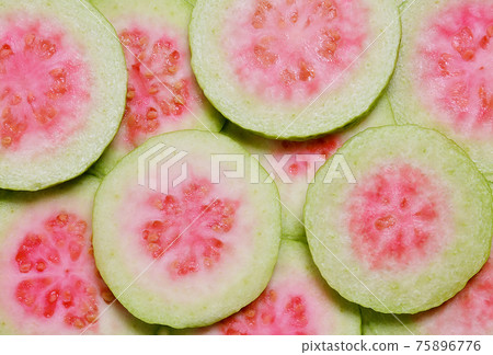 Pink Guava slice background Pink Guava Pink Guava slice background Pink Guava 75896776