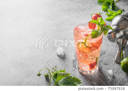 Freshness cocktail with strawberries puree, soda. Freshness cocktail with strawberries puree, soda. 75897816