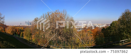Panoramic view of central Moscow from Sparrow Hills or Vorobyovy Gory observation (viewing) platform-- is on a steep bank 85 m above the Moskva river, or 200 m above sea level. Moscow, Russia Panoramic view of central Moscow from Sparrow Hills or Vorobyovy Gory observation (viewing) platform-- is on a steep bank 85 m above the Moskva river, or 200 m above sea level. Moscow, Russia 75897862