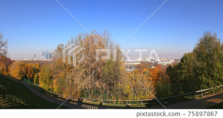 Panoramic view of central Moscow from Sparrow Hills or Vorobyovy Gory observation (viewing) platform-- is on a steep bank 85 m above the Moskva river, or 200 m above sea level. Moscow, Russia Panoramic view of central Moscow from Sparrow Hills or Vorobyovy Gory observation (viewing) platform-- is on a steep bank 85 m above the Moskva river, or 200 m above sea level. Moscow, Russia 75897867