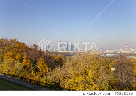 view of central Moscow from Sparrow Hills or Vorobyovy Gory observation (viewing) platform-- is on a steep bank 85 m above the Moskva river, or 200 m above sea level. Moscow, Russia 75898159