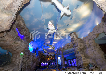 The interior of the Oceanarium Crocus City, over 5000 species of fish and other animals from all over the world. Moscow, Russia. 75898300