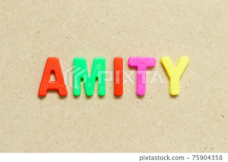 Color alphabet letter with word amity on wood background Color alphabet letter with word amity on wood background 75904358