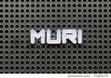 White color letter in word muri on black pegboard background 75904370