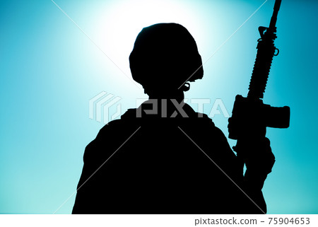 Marines shooter silhouette on background of sunset Marines shooter silhouette on background of sunset 75904653