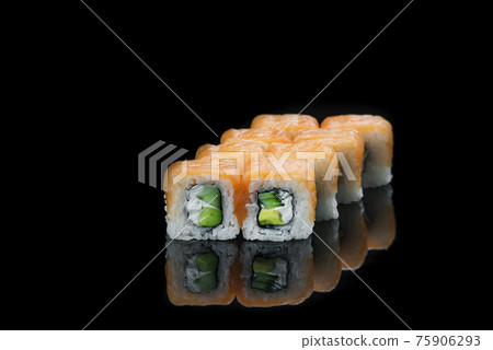 Sushi rolls with salmon, tuna, cucumber and green onions on black background Sushi rolls with salmon, tuna, cucumber and green onions on black background 75906293