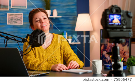 Blogger influencer recording video blog concept speaking at camera 75906477