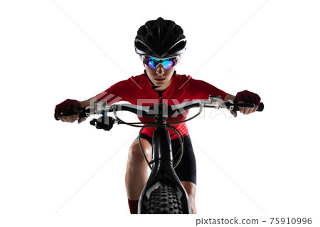 Close-up professional female cyclist on road bike isolated on white background. 75910996