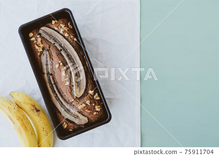 Freshly baked homemade gluten free banana bread cake. Freshly baked homemade gluten free banana bread cake. 75911704