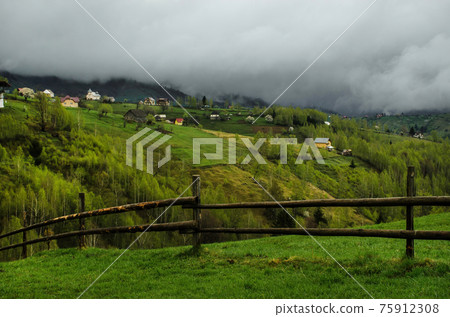 Clouds over the Carpathian Mountains, near Magura Village, Transylvania, Romania. Clouds over the Carpathian Mountains, near Magura Village, Transylvania, Romania. 75912308