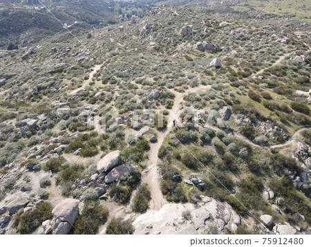 Aerial view of small trail in Simpson park wilderness valley in Santa Rosa Hills. Hemet, California 75912480