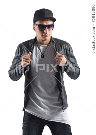 Fashion portrait of young handsome man. Cool rap dj, electro house music, deep house, mens fashion style,black style, leather jacket, rap, cat, b-boy, freestyler, singer, talented rap singer Fashion portrait of young handsome man. Cool rap dj, electro house music, deep house, mens fashion style,black style, leather jacket, rap, cat, b-boy, freestyler, singer, talented rap singer 75912890