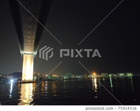 Urban highway bridge and sea 75914316