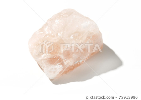 Photographed a mass of pink rock salt on a white background Photographed a mass of pink rock salt on a white background 75915986