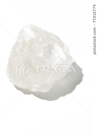 Photographed a block of rock salt that is as clear as crystal on a white background 75916774