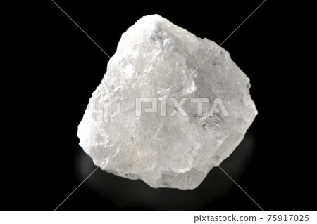 Photographed a block of rock salt that is as clear as crystal on a black background Photographed a block of rock salt that is as clear as crystal on a black background 75917025