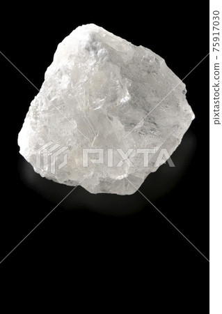 Photographed a block of rock salt that is as clear as crystal on a black background Photographed a block of rock salt that is as clear as crystal on a black background 75917030