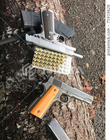 Gun Society American / Old-fashioned black military pistols and new automatic pistols, vertical Gun Society American / Old-fashioned black military pistols and new automatic pistols, vertical 75919826