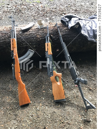 Gun Society America / 3 rifles leaned against Gun Society America / 3 rifles leaned against 75919827