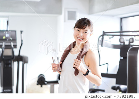 Asian woman sweating at the gym Asian woman sweating at the gym 75921993