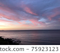 Calm sunset and sea 75923123
