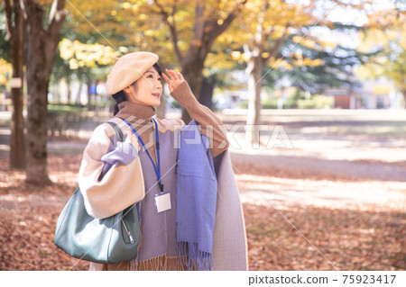A named woman in an autumn park A named woman in an autumn park 75923417