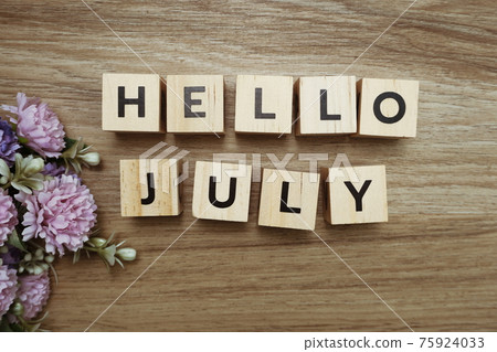 Hello July alphabet letters on wooden background 75924033