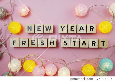 New Year Fresh Start alphabet letter on pink background New Year Fresh Start alphabet letter on pink background 75924207