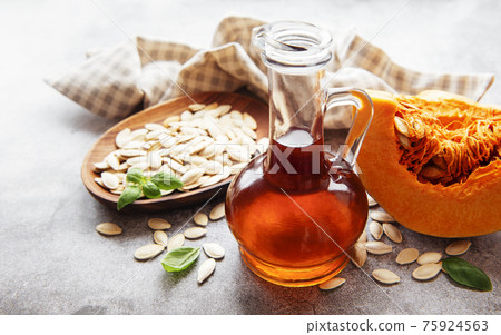 Bottle with pumpkin seed oil Bottle with pumpkin seed oil 75924563