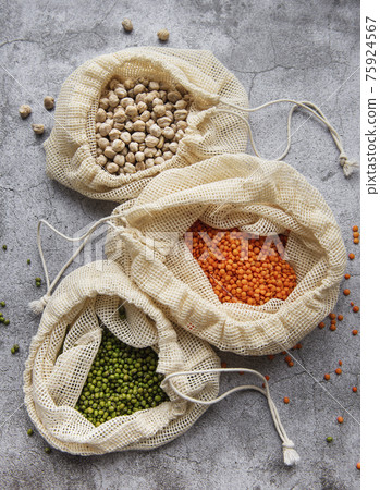 Eco bags with different types of legumes Eco bags with different types of legumes 75924567