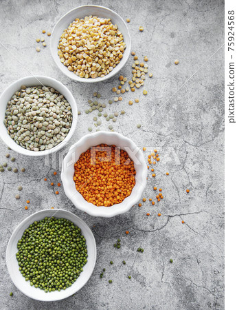 Bowls with different types of legumes Bowls with different types of legumes 75924568