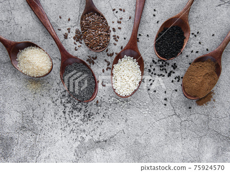 Wooden spoons with various healthy seeds and spices Wooden spoons with various healthy seeds and spices 75924570