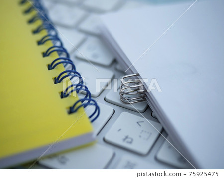 Business image · document · keyboard · notebook · woman 75925475