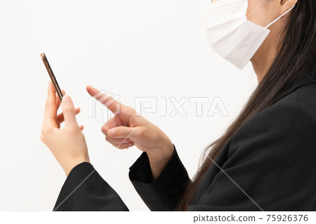 Business woman smartphone mask at hand 75926376