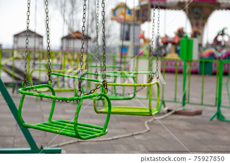 Kyiv, Ukraine - March, 22, 2020: Empty children's attraction. Quarantine during COVID-19. 75927850