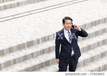 Businessman smartphone outdoor phone Businessman smartphone outdoor phone 75928663