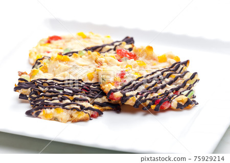 still life of cookies with candy fruit, nuts and chocolate still life of cookies with candy fruit, nuts and chocolate 75929214