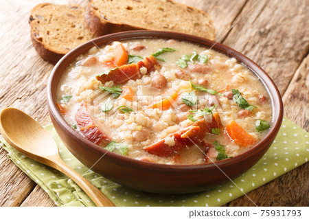 Slovenian Meat and Vegetable Barley Soup Ricet close-up in a bowl. Horizontal Slovenian Meat and Vegetable Barley Soup Ricet close-up in a bowl. Horizontal 75931793