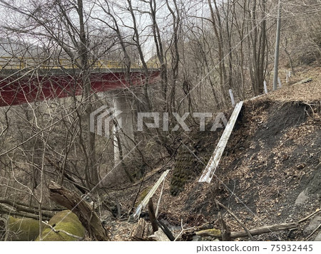Road landslide guardrail fallen leaves buried Road landslide guardrail fallen leaves buried 75932445